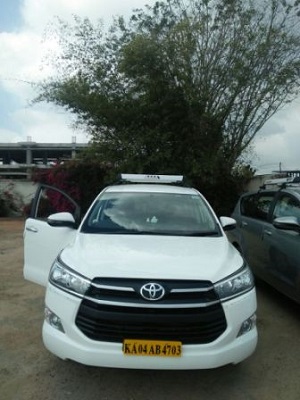 airport taxi innova bangalore, toyota innova airport taxi bangalore, innova taxi from bangalore airport, innova taxi in bangalore airport, innova taxi service bangalore airport, innova taxi to bangalore airport